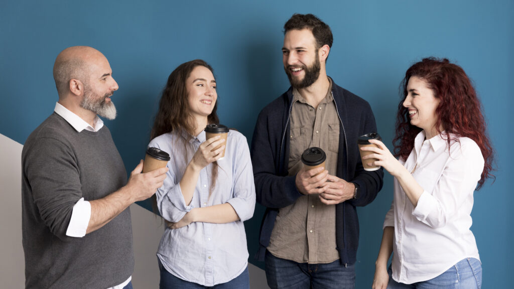 front view colleagues having coffee together