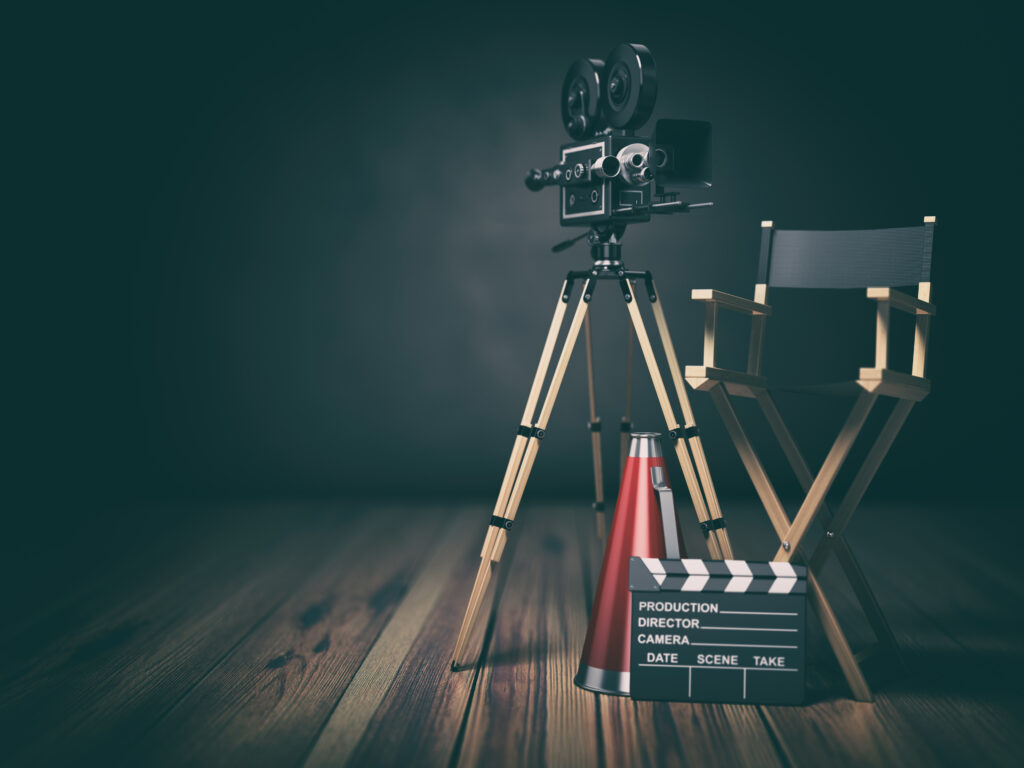 video, movie, cinema concept. retro camera, clapperboard and director chair. 3d